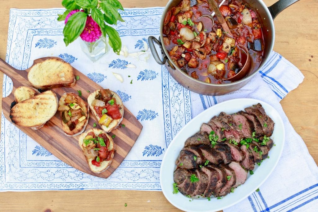 ratatouille served with steak and bread