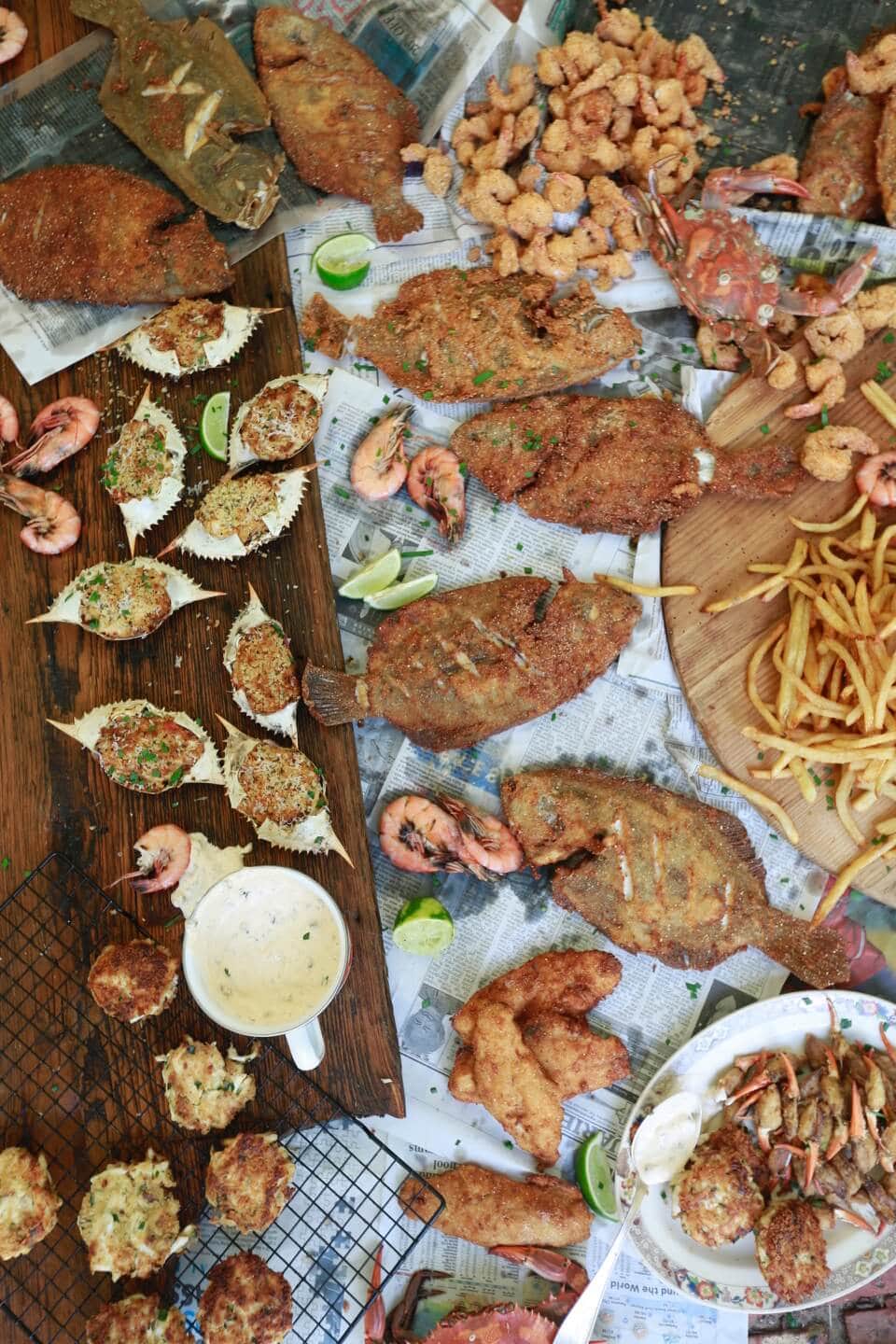 Assortment of fried seafood, fish fry after catching shrimp crab and fish at the beach