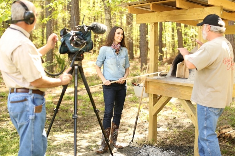Stacy on Venture Outdoor TV Show making Rustic Bread in Earthen Oven
