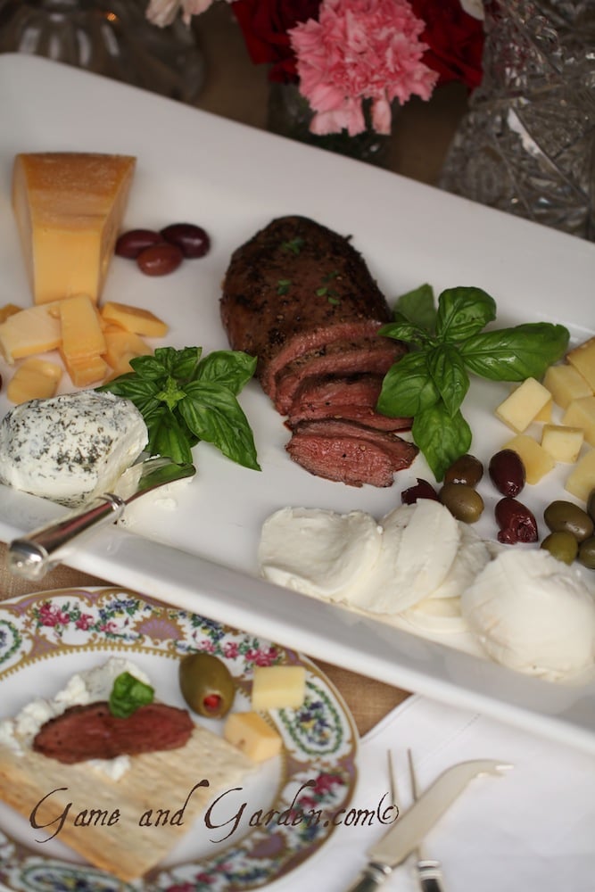I love starting the night with a duck, cheese, and olive sampler that is bursting with flavor and simple elegance.