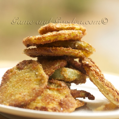 Fried Green Tomatoes Ingredients 4 large firm green tomatoes 1 cup all-purpose flour 1 teaspoon salt, more for sprinkling 1/2 teaspoon pepper 2 eggs 1 Tablespoon water 1 cup bread crumbs 1 cup Olive Oil for frying 4 Tablespoons butter Slice the tomatoes 1/4 inch thick. On a large plate, mix flour, salt, and pepper. On a second plate beat eggs and water together. Place bread crumbs on a third plate. Coat tomato slices into seasoned flour, then egg mixture, then bread crumbs. In a hot sauté pan, mix butter and oil. When sizzling, place coated slices in pan for about 2 to 3 minutes per side or until tomatoes are tender. Cook in batches and add more oil if needed. Transfer to a platter, sprinkle with extra salt and serve warm. For a healthier version of this recipe, check out my Healthier Crunchier "Baked" Fried Green Tomato recipe.