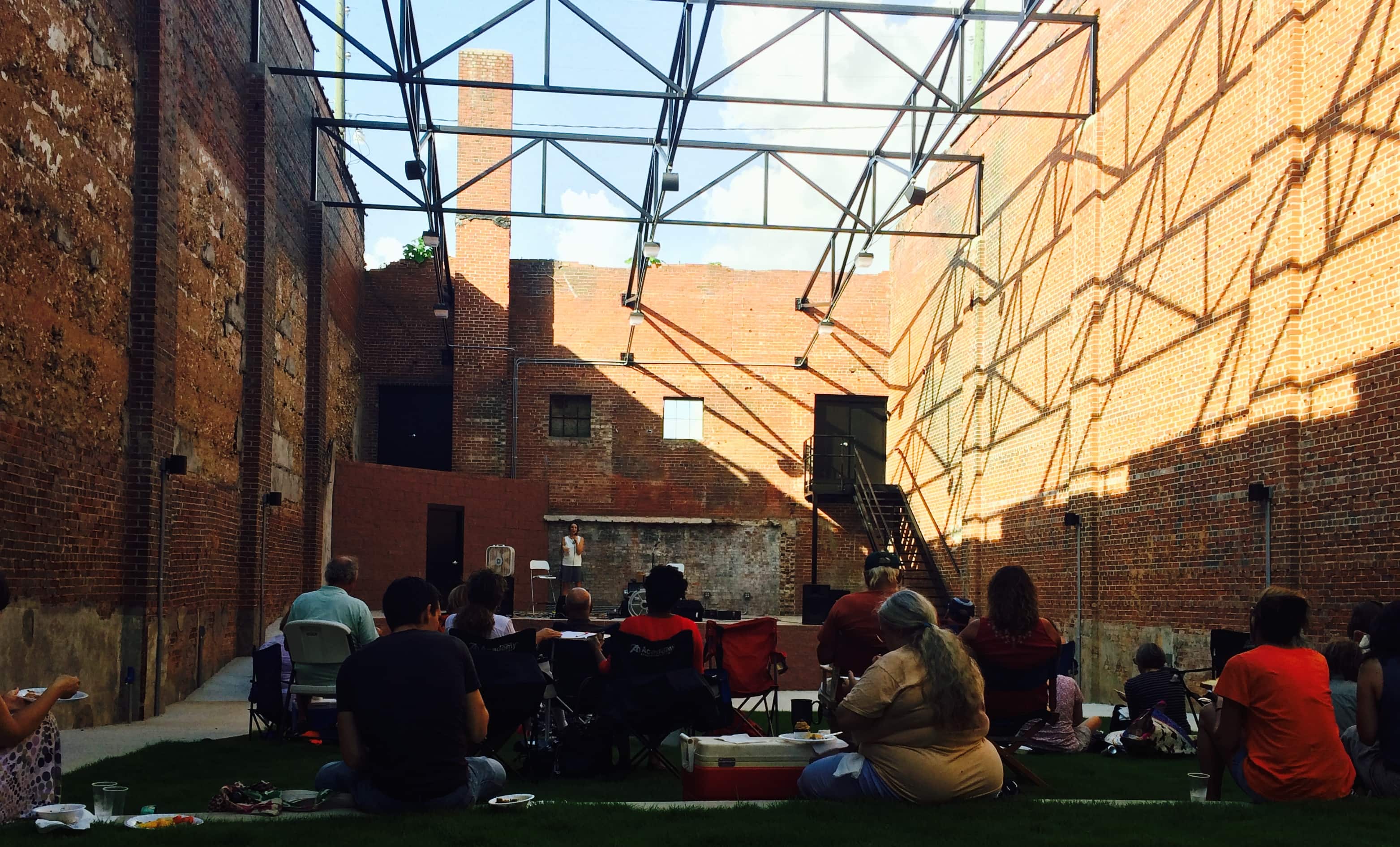 Isn't this architecture beautiful. I love the exposed brick in this open-air theatre and the tiered grass in the courtyard. It is perfect for concerts, speaking events, etc. It was a privilege to speak here about SLOW FOODS!
