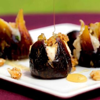 Figs baked and stuffed with honey mascarpone cheese filling drizzled with honey