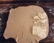 Place the butter onto the dough (recipe for how to make danish pastries by Stacy Lyn Harris)