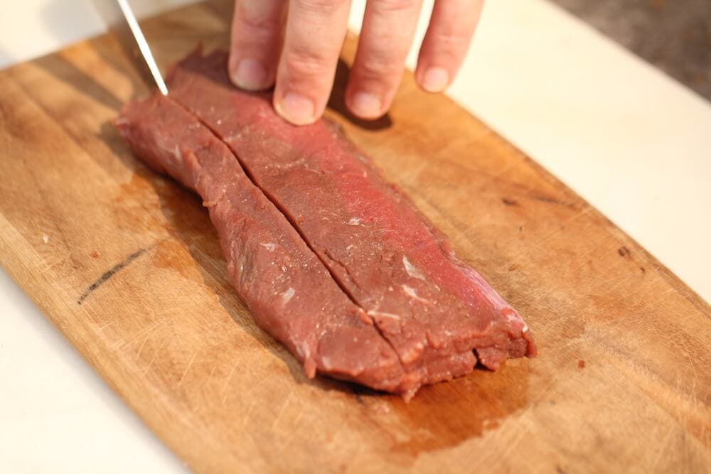 Picture of venison tenderloin, demonstrating the butterfly technique to stuff venison loins, photo by Stacy Lyn Harris