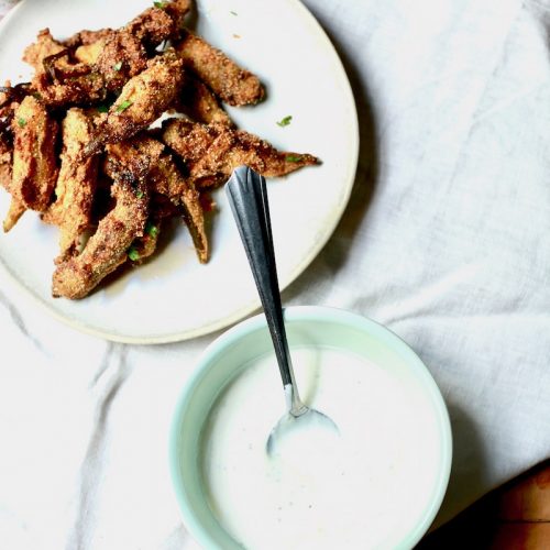 fried pickled okra with yogurt topping