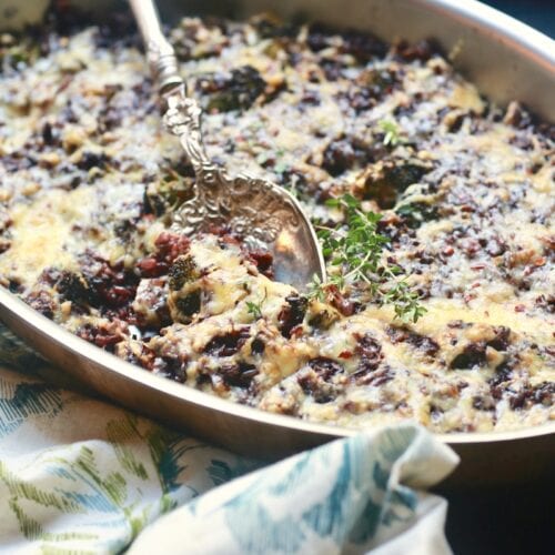 Cheesy wild rice casserole with broccoli and thyme casserole branches on top