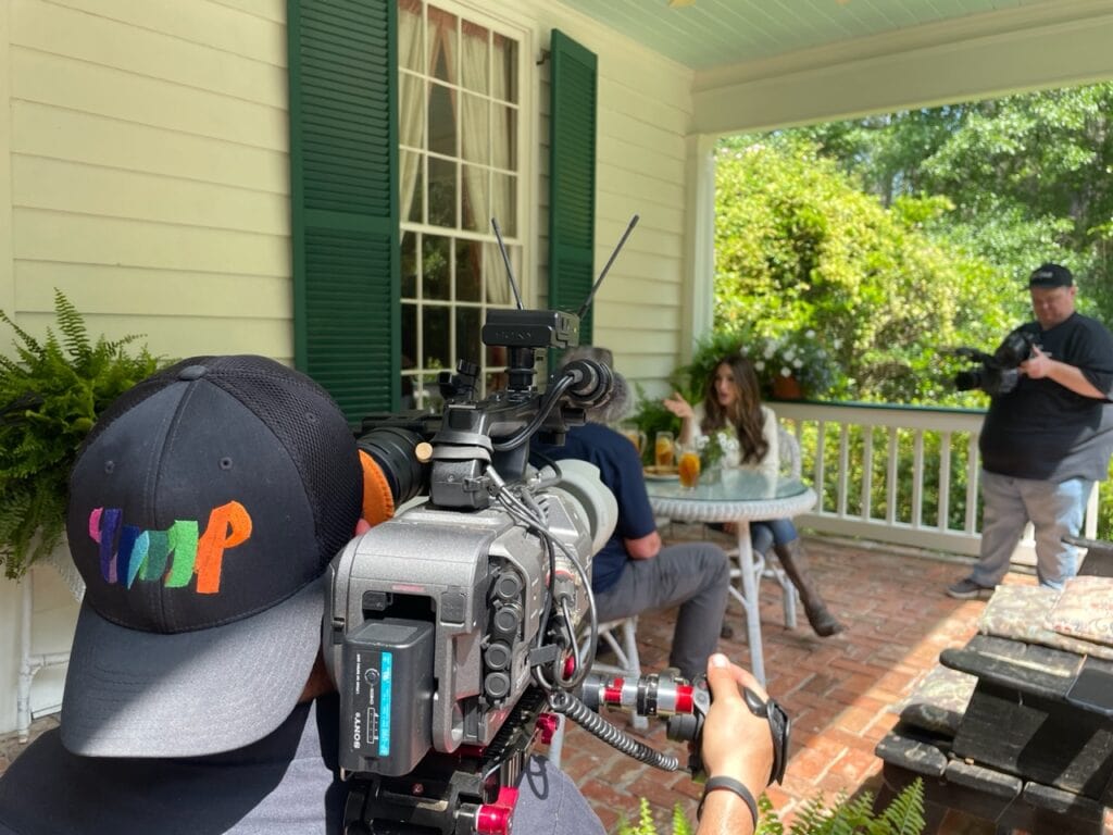camera crew filming Stacy Lyn on porch for Sporting Chef