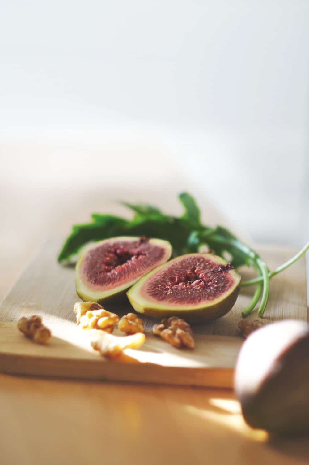 a fresh fig sliced in half, ready to add flavor to this dove recipe